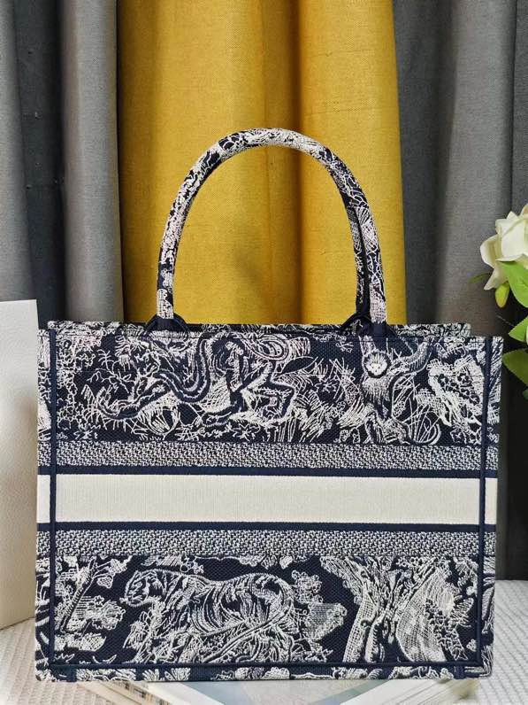 large D*or book tote blue and ecru toile de jouy reverse embroidery 16.5 x 14 x 7.5 inches