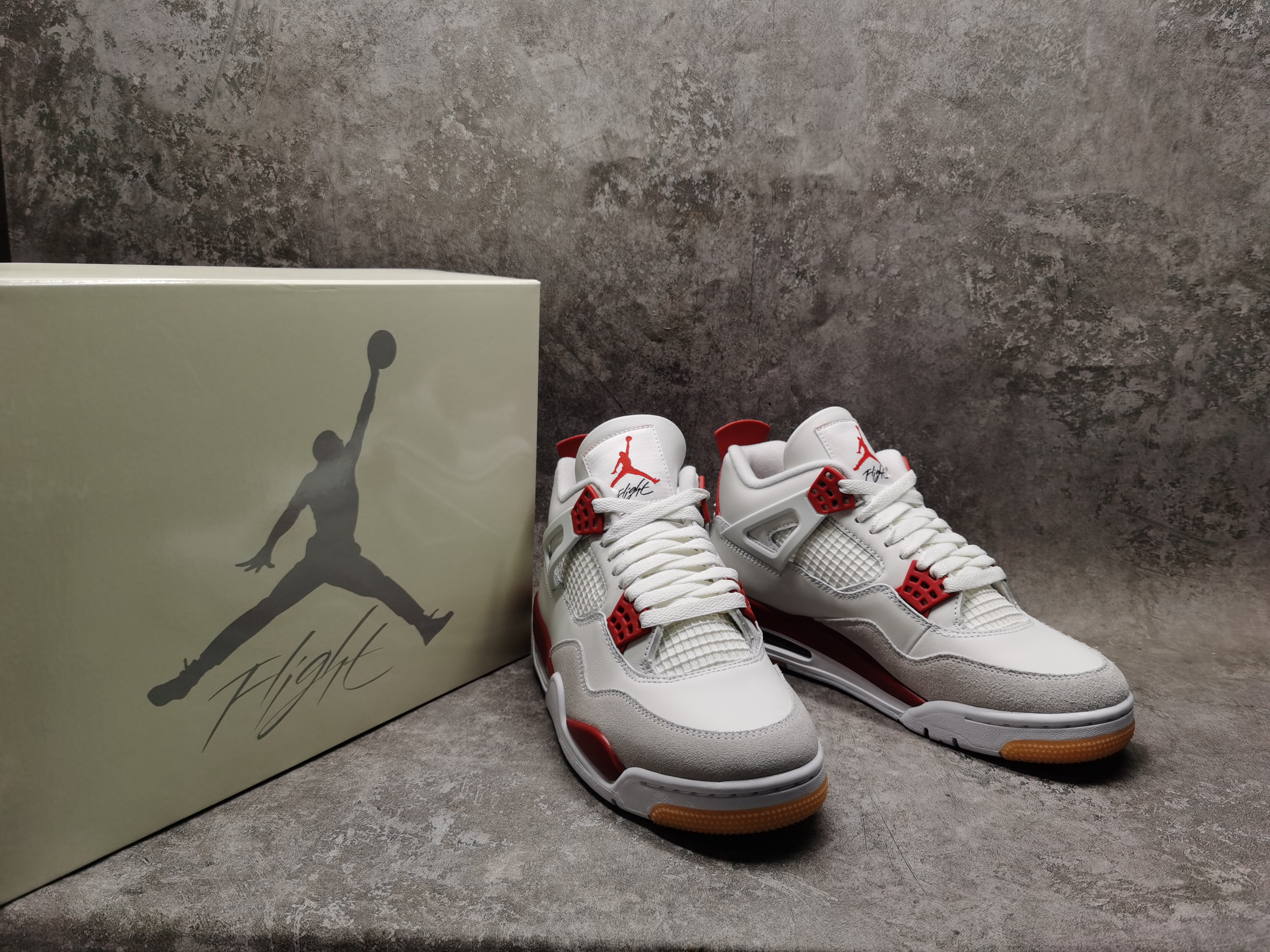 UA Jordan 4 Retro SB