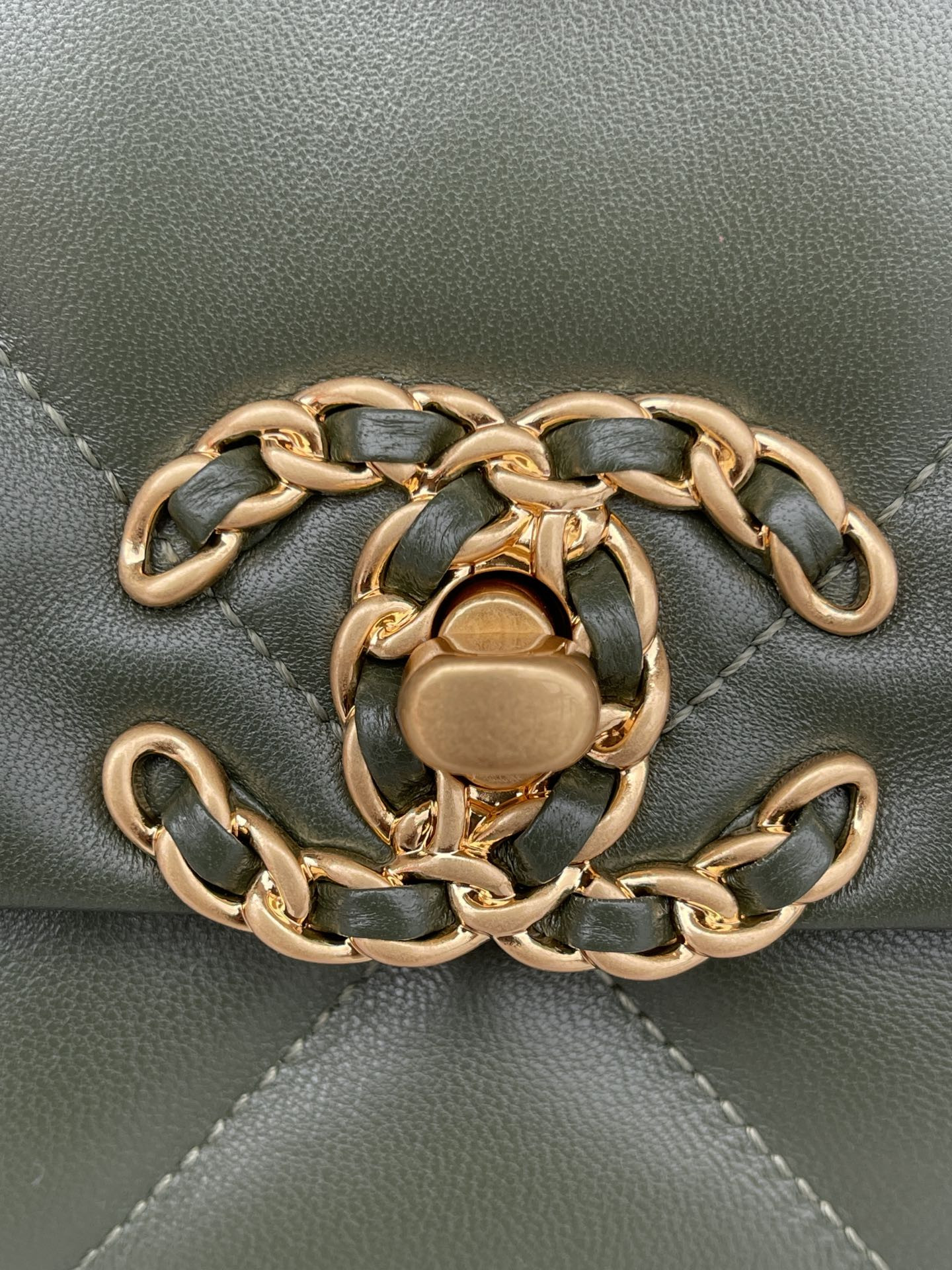 Ch*el 19 large handbag shiny leather, gold-tone, silver-tone & ruthenium-finish metal dark green 7.8 × 11.7 × 3.9 in