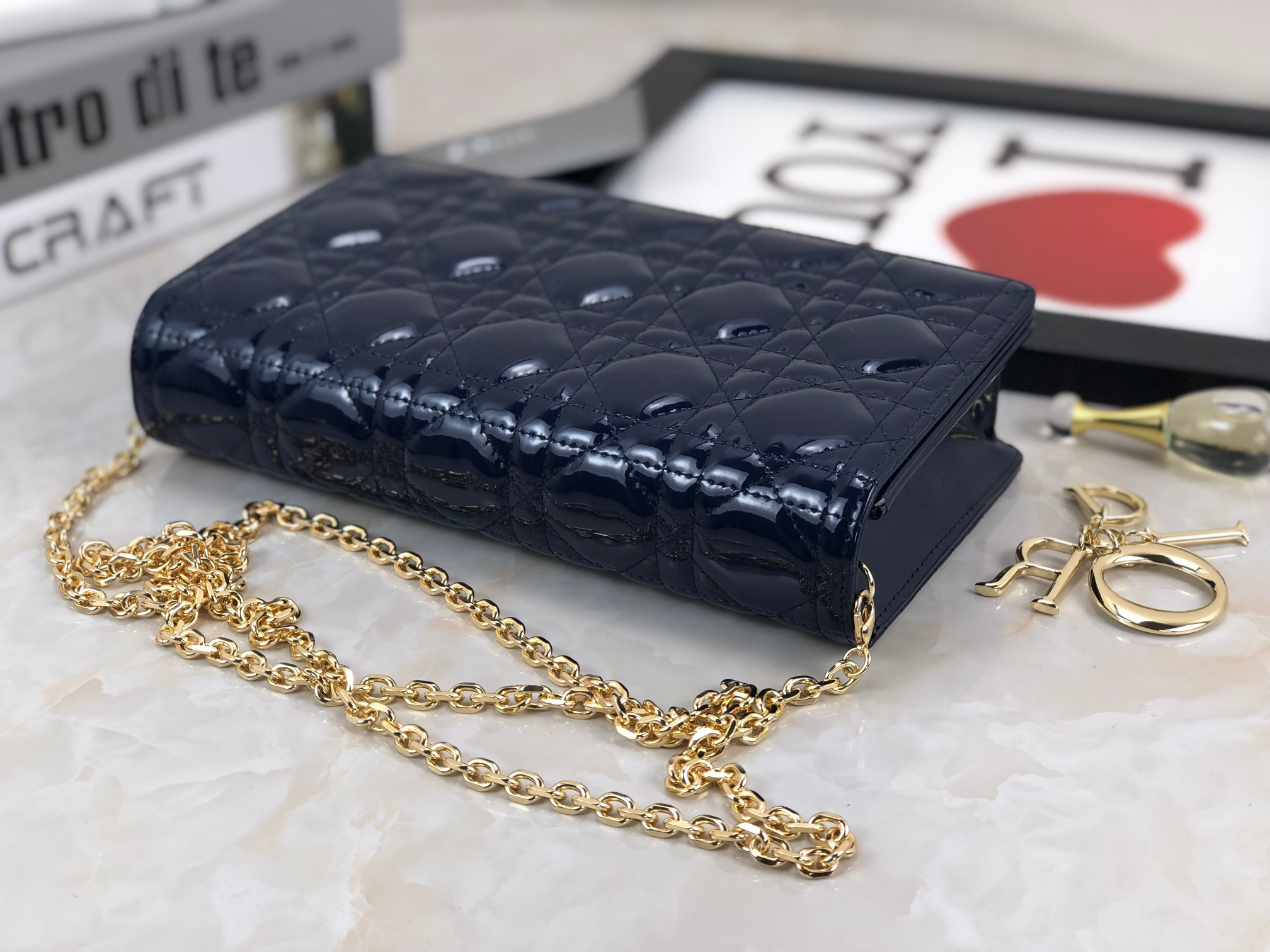 lady D*or pouch navy patent cannage calfskin 8.5 x 4.5 x 1 inches