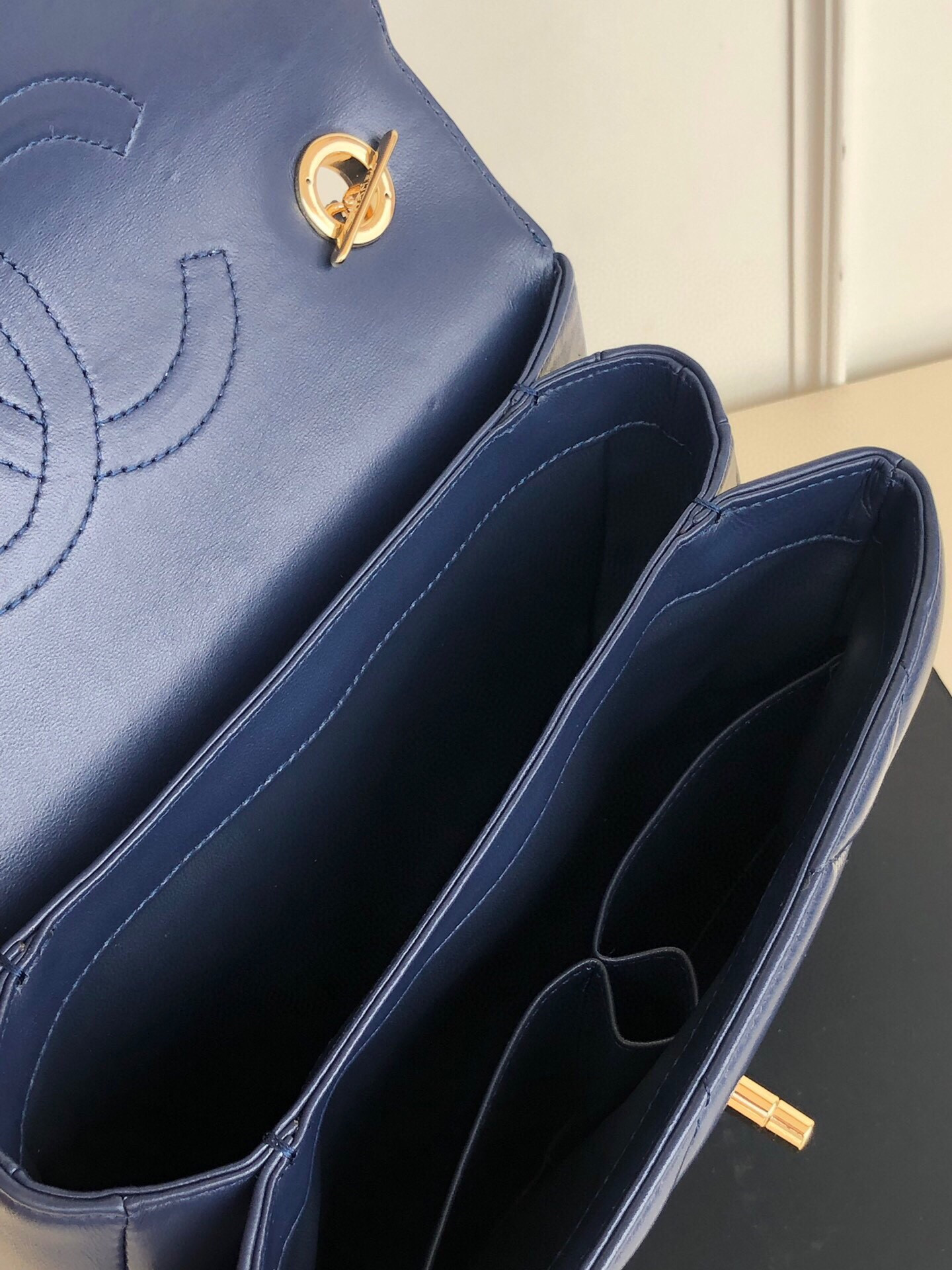 Ch*el flap bag with top handle 6.6 × 9.8 × 4.7 in