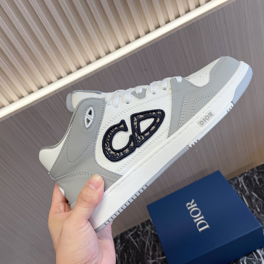 ua D*or b57 mid-top sneaker gray and white
