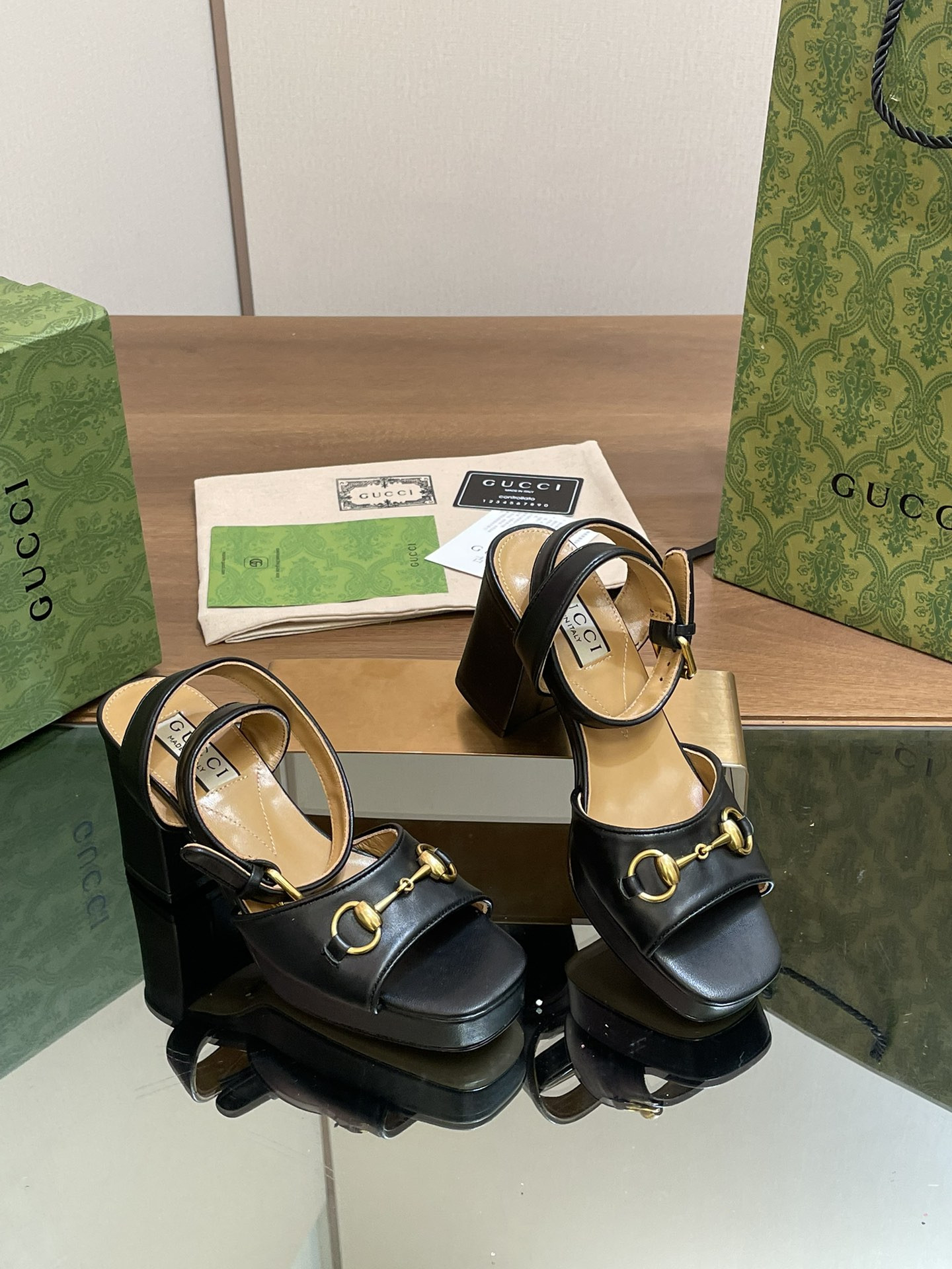 ua G*u*i horsebit platform sandal